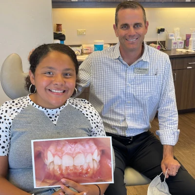 Teen Holding Braces Before & After 7